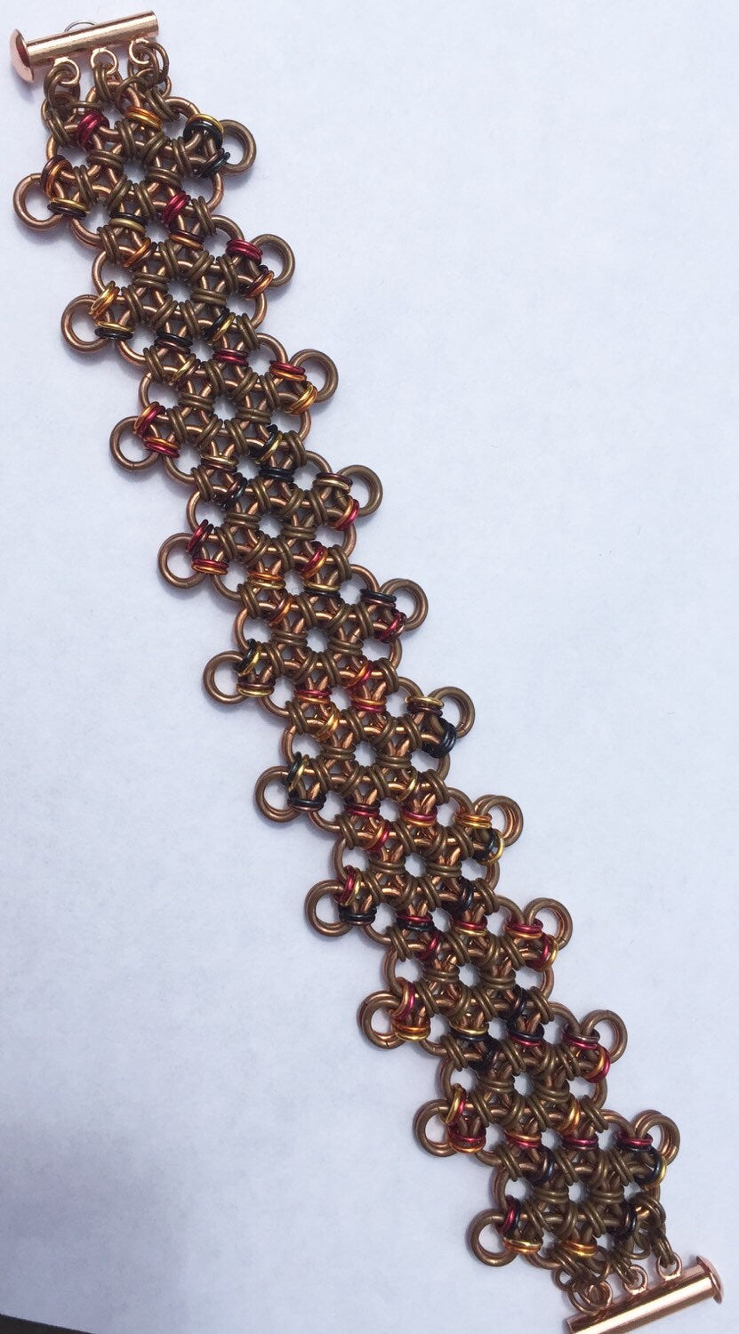 Japanese diamond weave, patina-ed copper anodized aluminum accents